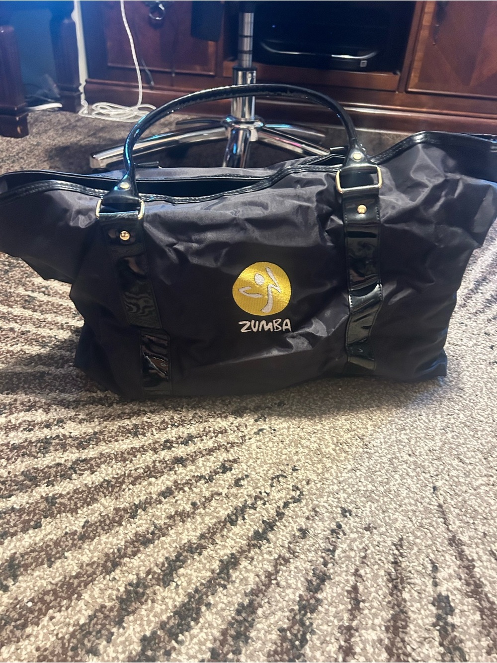 Zumba Fitness Black Duffel Bag with Gold Logo Accent